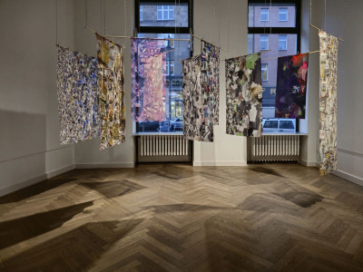 You can see fabric banner with fragments of a pictures.