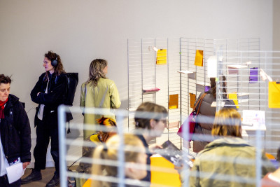 People stand in the LIVErary