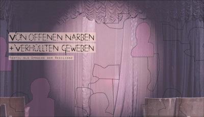 Ein Spotligeht ist auf einen Vorhang gerichtet